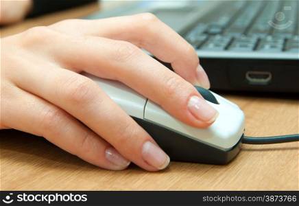 hands fast typing on laptop