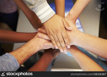Hands From Young People Of Different Races Joined Together