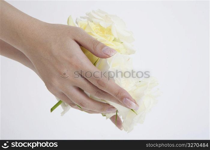 Hands holding flowers