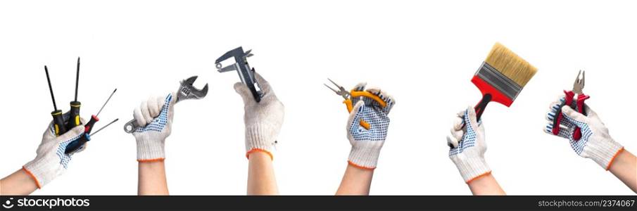 Hands in work gloves hold repair tools. Happy labor day concept. Screwdriver, wrench, pliers on a white background.. Hands in work gloves hold repair tools. Happy labor day concept. Screwdriver, wrench, pliers on white background.
