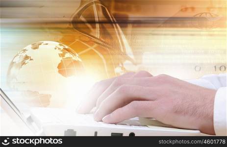 Hands of businessman running with fingers on laptop keyboard. E-business concept