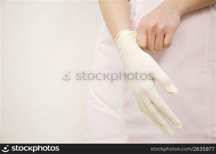 Hands of dental hygienist