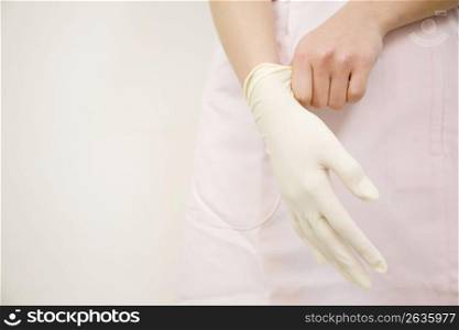 Hands of dental hygienist