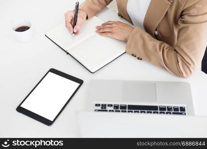 Hands of financial business women manager taking notes when working on report