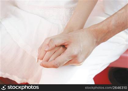 Hands of Japanese couple