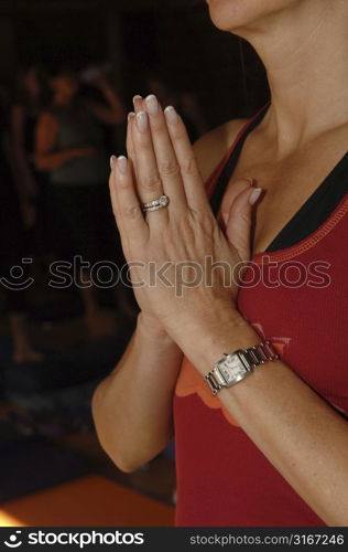 Hands of meditating woman