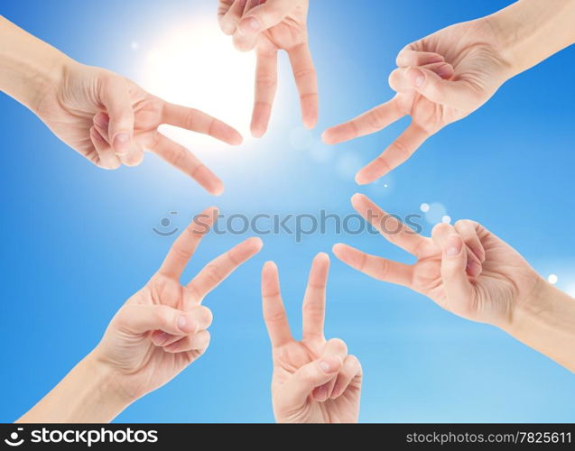 Hands of teamwork , forming the star shape