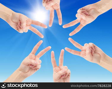 Hands of teamwork , forming the star shape