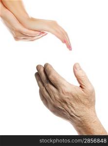 Hands of young woman and elderly man over white background