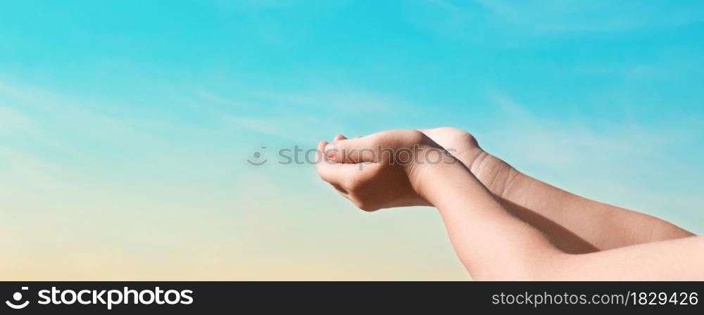 Hands reaching for the sky sunset background. Hope concept