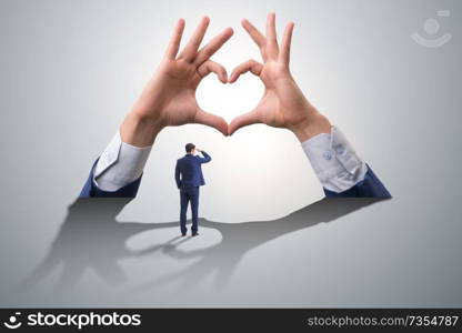 Hands showing heart gesture in love concept