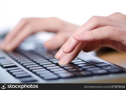 Hands typing on the keyboard