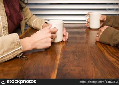 Hands with Mugs