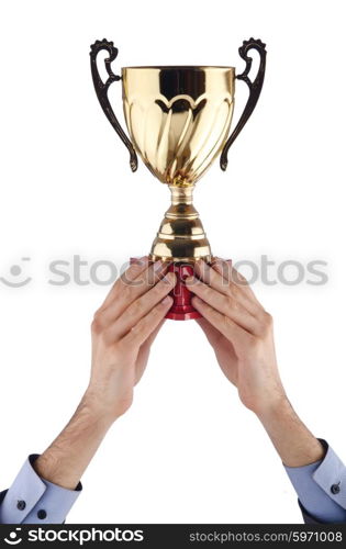 Hands with winners cup on white