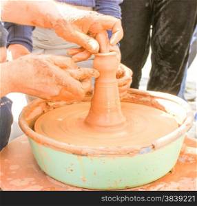 Hands working on pottery wheel. Pottery Work.. Pottery Work.