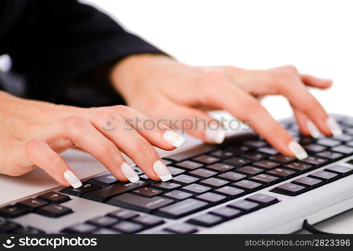 Hands working on the keyboard