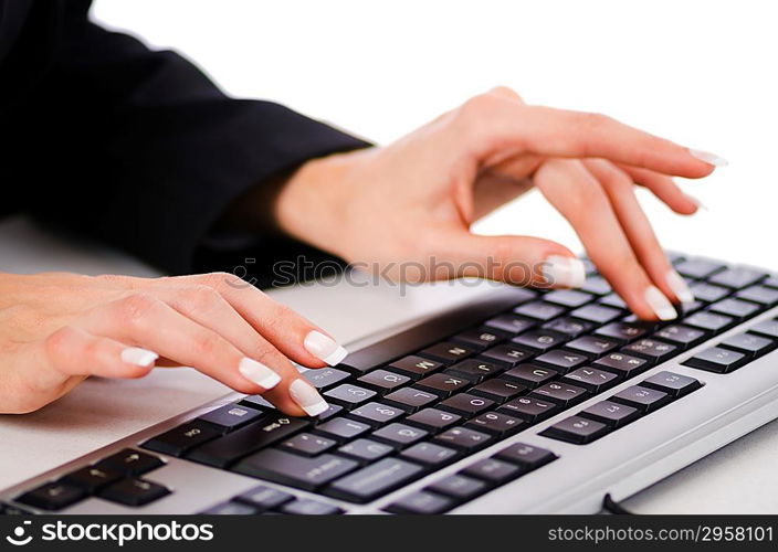 Hands working on the keyboard