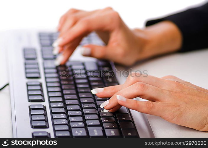 Hands working on the keyboard