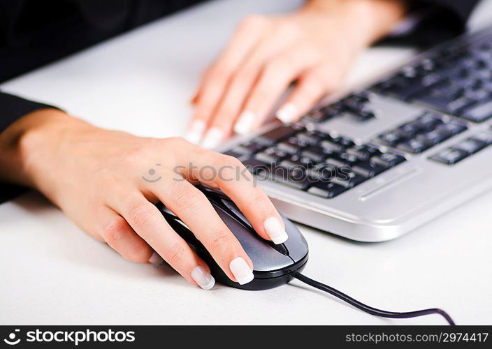 Hands working on the keyboard