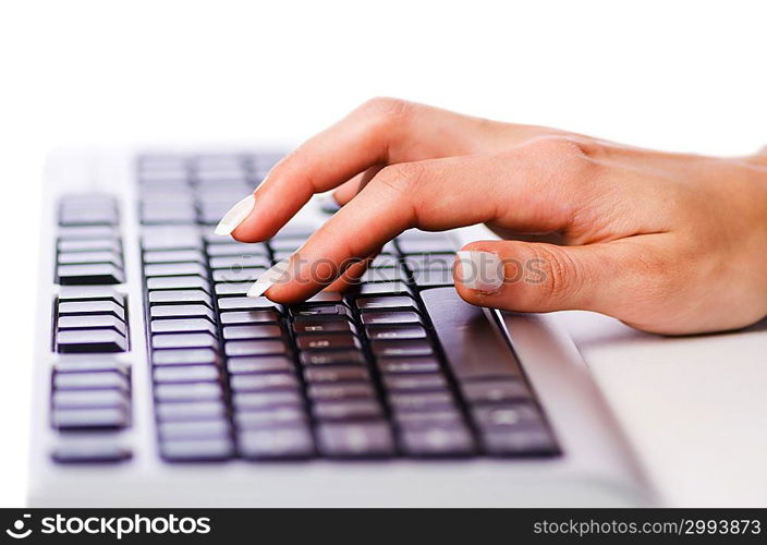 Hands working on the keyboard