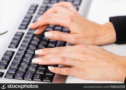 Hands working on the keyboard