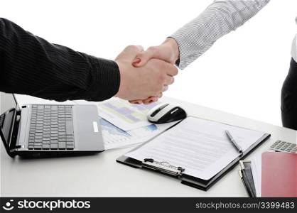 Handshake of business partners, when signing documents. Isolated on white background