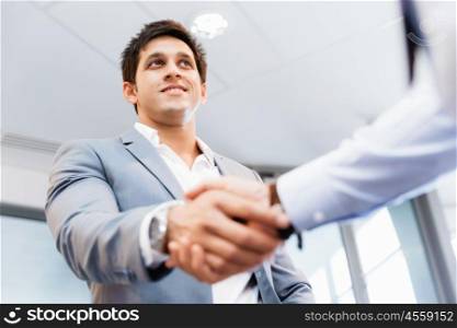 Handshake of businessmen greeting each other. Handshake of businessmenoncepts - soft focus