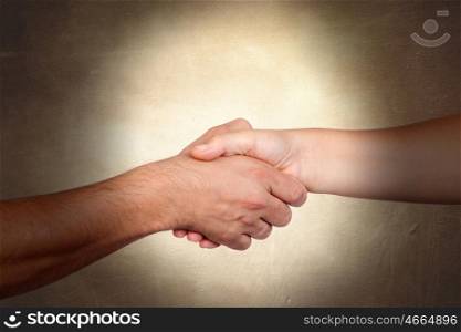 Handshake symbolizing the relationships between people