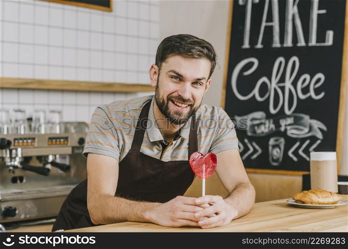 handsome bartender with lollipop