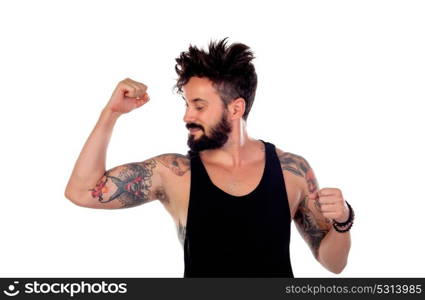 Handsome bearded man with tattoos on his body