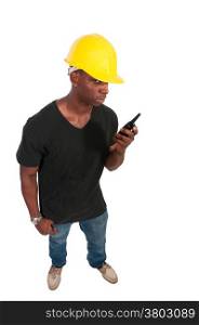 Handsome black man construction worker talking on a walkie talkie