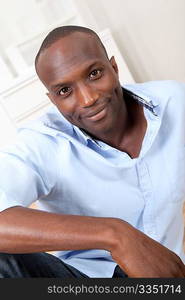 Handsome black man relaxing at home