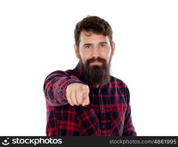 Handsome boy pointing at camera with his finger isolated on a white background