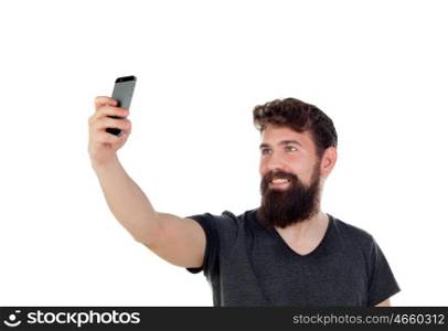 Handsome boy with long beard and a mobile isolated on white