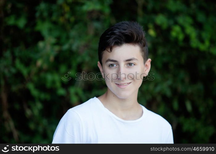 Handsome brown-haired teen in the park