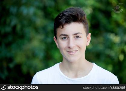 Handsome brown-haired teen in the park