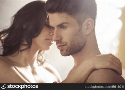 Handsome brunet with his sensual wife
