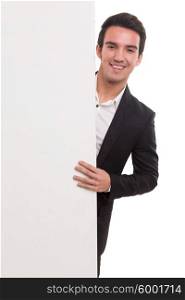 Handsome business man presenting your product on a white board