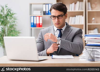 Handsome businessman working in the office