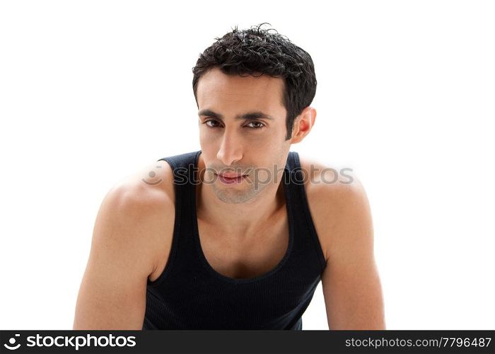Handsome Caucasian guy wearing black tank top showing bare shoulders and 5 o?clock shadow, isolated