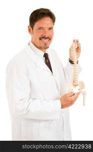 Handsome chiropractor holding up a scale model of the human spine. Isolated on white.