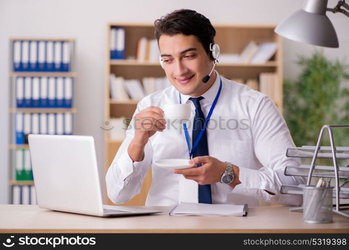 Handsome customer service clerk with headset