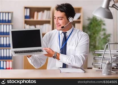 Handsome customer service clerk with headset