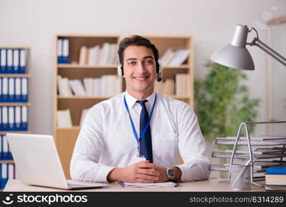 Handsome customer service clerk with headset