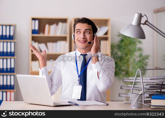 Handsome customer service clerk with headset