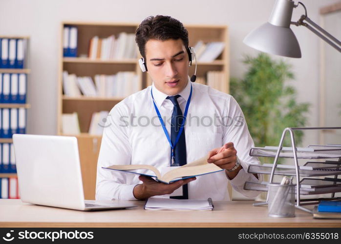 Handsome customer service clerk with headset