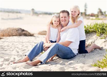 Handsome Dad and His Cute Daughters Portrait at The Beach