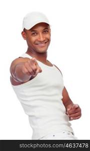 Handsome guy dressed in white pointing at camera with his finger isolated wearing cap