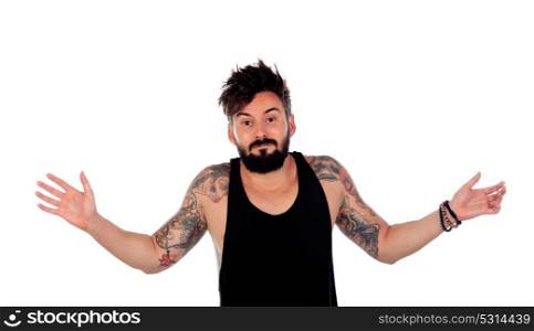 Handsome guy with tattoos apologizing isolated on a white background