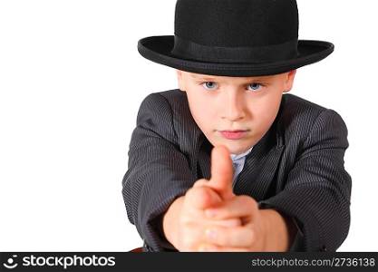 handsome little boy wearing suit and hat is playing gangster. isolated.